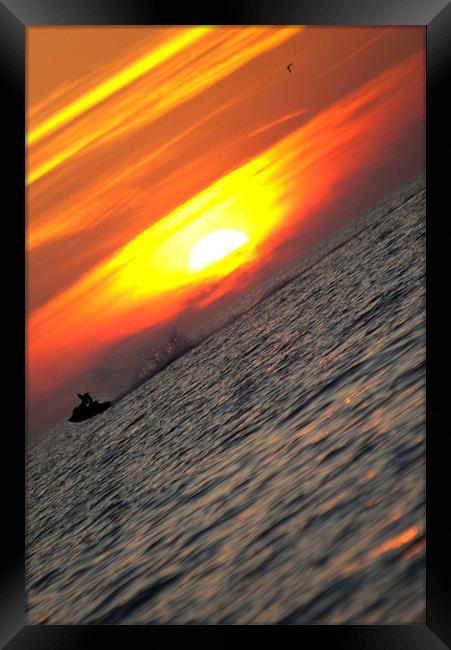 sunset jetski ride Framed Print by nina saunders