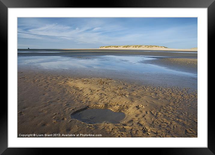 Paw prints in the sand, Wells-next-the-sea. Framed Mounted Print by Liam Grant