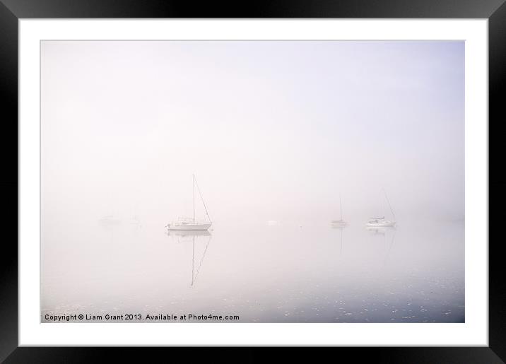 Boats in fog on Lake Windermere. Waterhead, Lake D Framed Mounted Print by Liam Grant