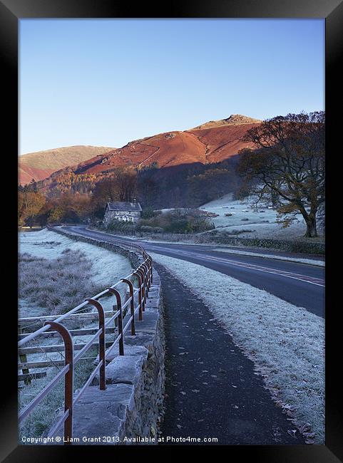 Frost covered road to Grasmere, Lake District. Framed Print by Liam Grant