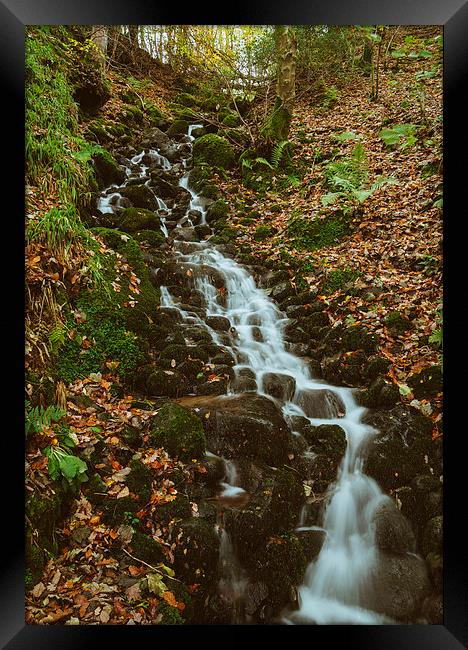 Small waterfall along the Keswick disused railway above the Rive Framed Print by Liam Grant