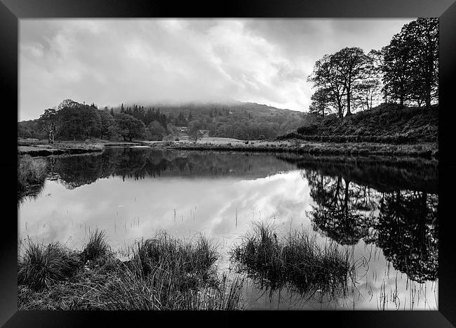 Dramatic sky and reflections on the River Brathay  Framed Print by Liam Grant