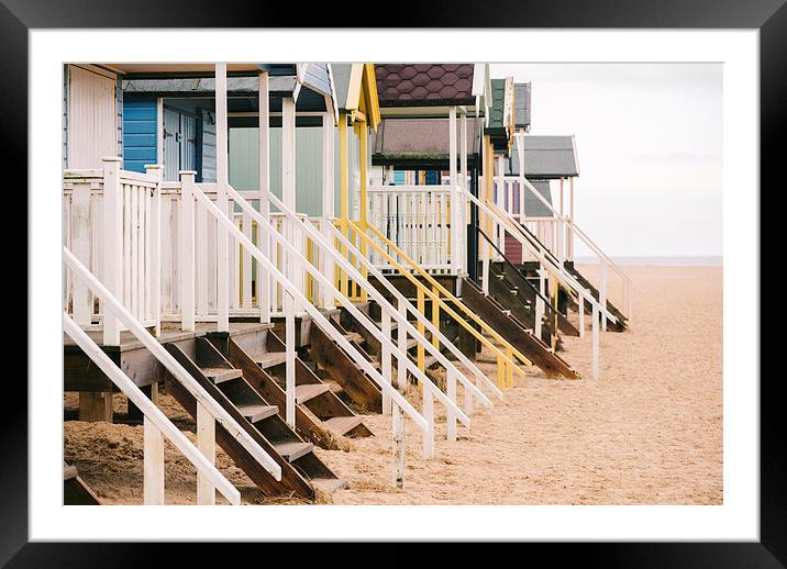 Beach huts at Wells-next-the-sea. Framed Mounted Print by Liam Grant