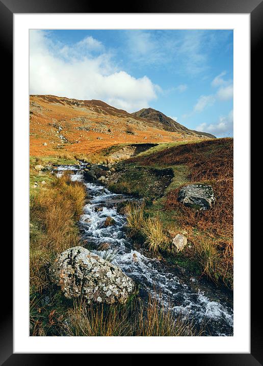 Cinderdale Beck flowing below Whiteless Pike towar Framed Mounted Print by Liam Grant