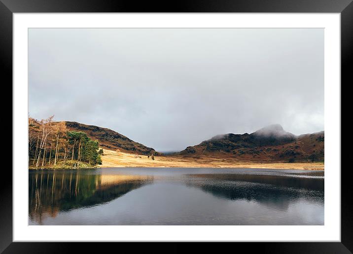 Low cloud and reflections on Blea Tarn. Framed Mounted Print by Liam Grant