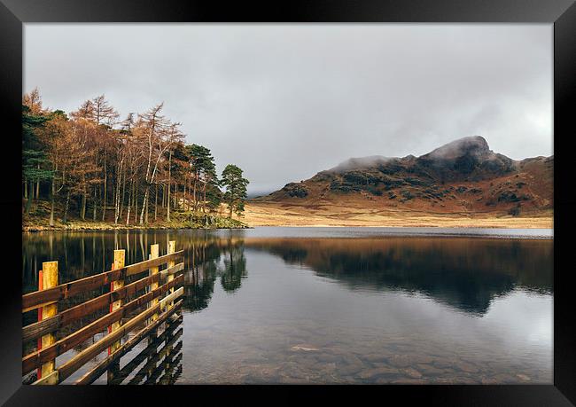 Low cloud and reflections on Blea Tarn. Framed Print by Liam Grant