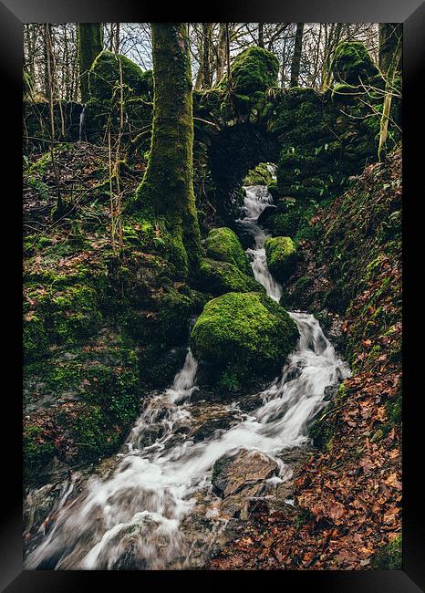 Stone bridge over waterfall near Stockghyll Force. Framed Print by Liam Grant