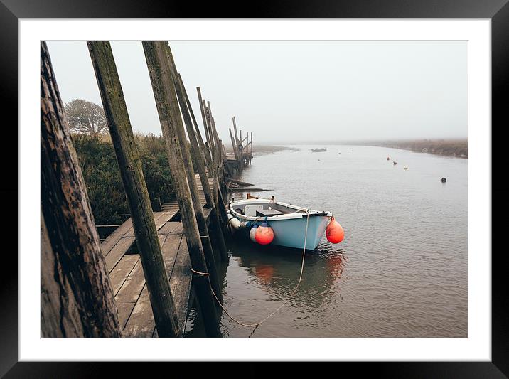 Boats moored at Blakeney in fog. Framed Mounted Print by Liam Grant
