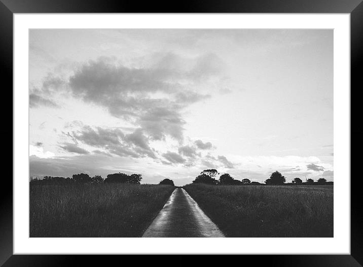 Evening thunder storm and clouds over rural scene. Framed Mounted Print by Liam Grant