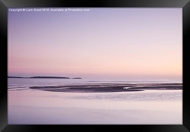 Colourful twilight sky at low tide. Burry Port, Wa Framed Print by Liam Grant