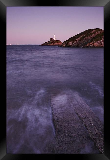 Lighthouse at dusk. Mumbles, Wales, UK. Framed Print by Liam Grant