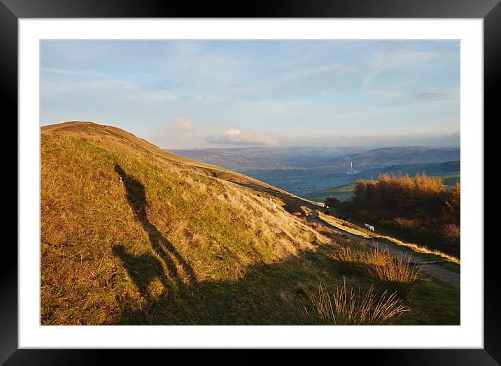 Shadow of a male and his dog on mounatinside at su Framed Mounted Print by Liam Grant