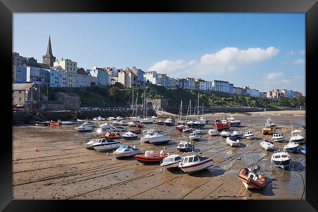 Boats in Tenby Harbour at low tide. Wales, UK. Framed Print by Liam Grant