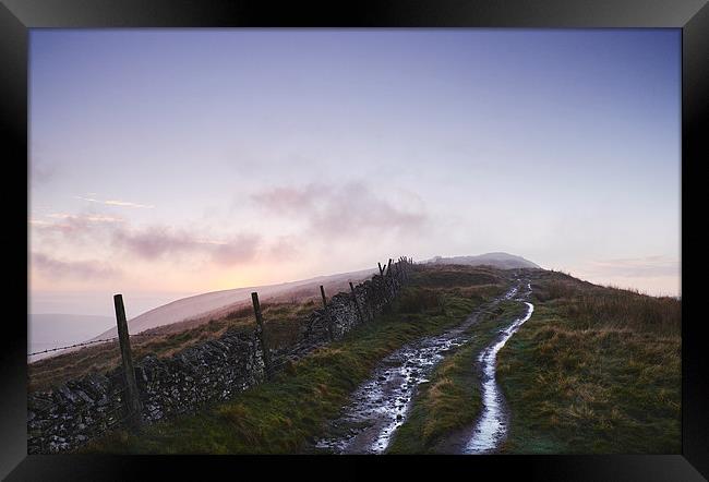 Mountain path and fence at sunset. Derbyshire, UK. Framed Print by Liam Grant