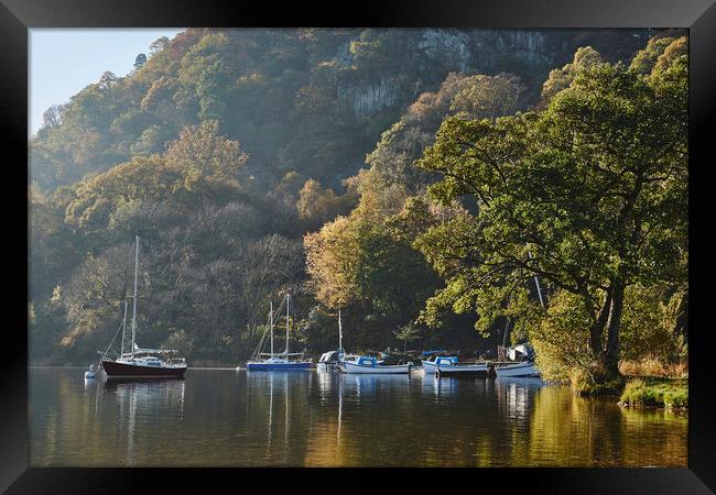 Boats and autumnal colour. Ullswater, Cumbria, UK. Framed Print by Liam Grant