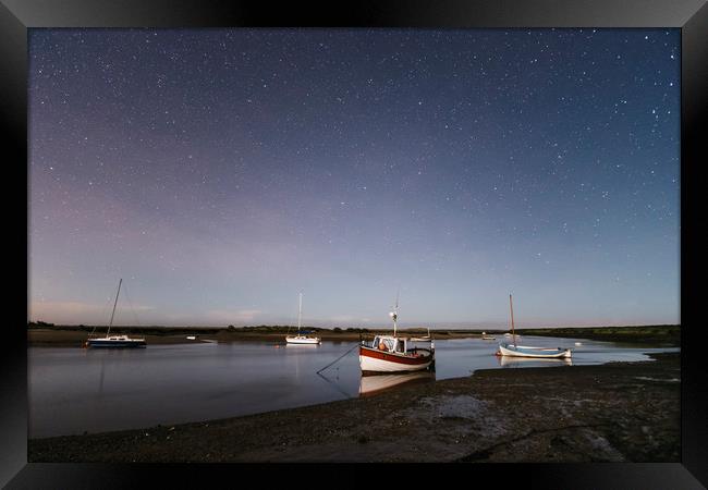 Boats under stars on a moonlit night. Burnham Over Framed Print by Liam Grant