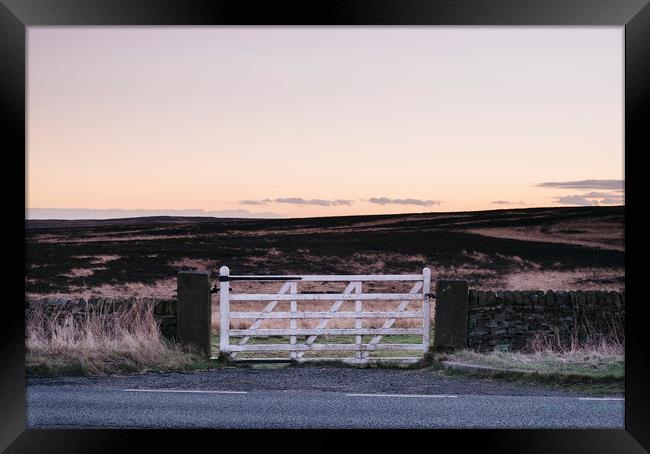 White gate leading to moorland at twilight. Derbys Framed Print by Liam Grant
