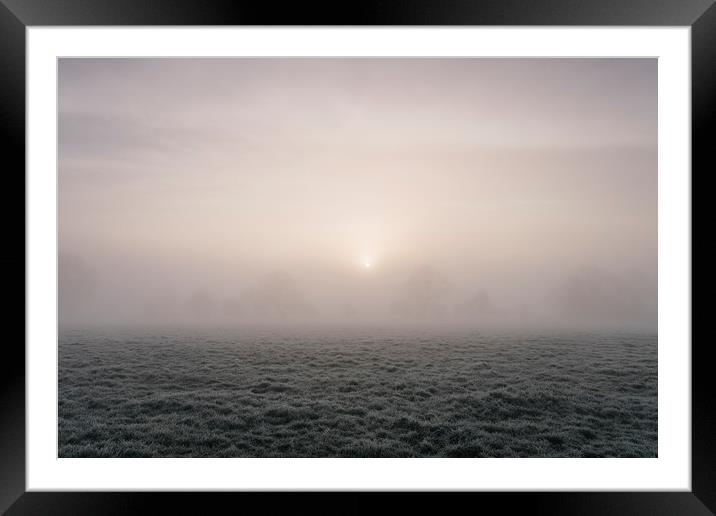 Sunrise through fog on a frosty morning. Norfolk,  Framed Mounted Print by Liam Grant