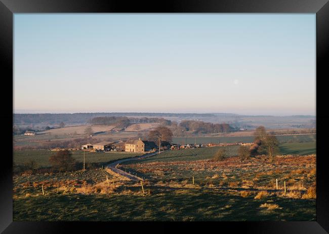 Moon over a farm at sunrise. Derbyshire, UK. Framed Print by Liam Grant