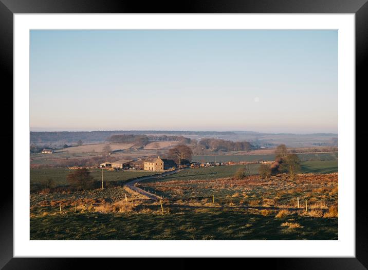 Moon over a farm at sunrise. Derbyshire, UK. Framed Mounted Print by Liam Grant