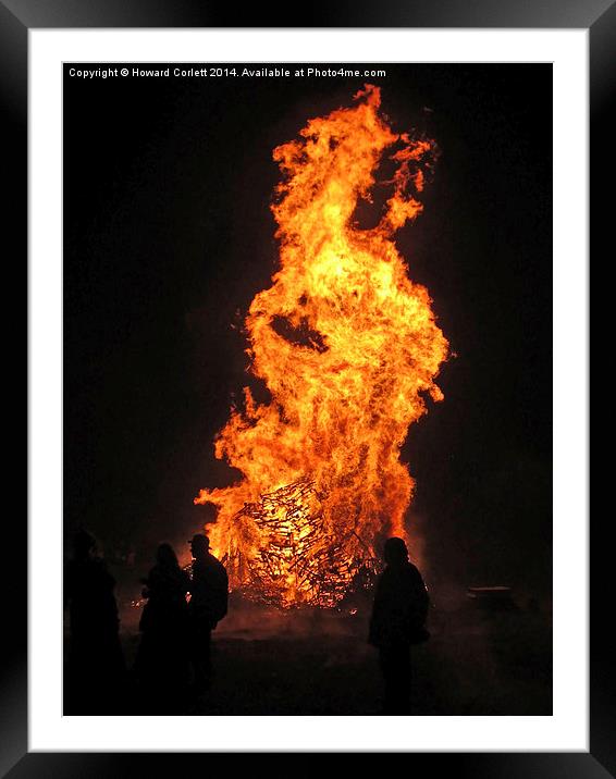 Bonfire silhouettes Framed Mounted Print by Howard Corlett