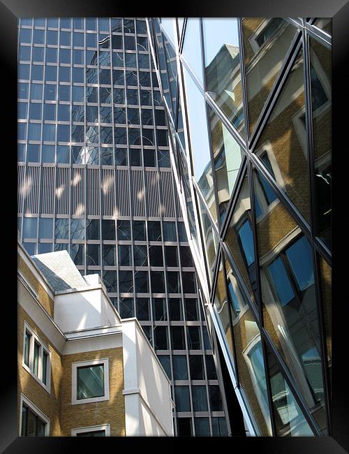 Reflected buildings Framed Print by Howard Corlett