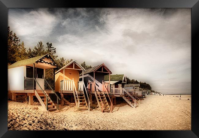 Beach Huts at Wells Framed Print by Simon Wrigglesworth