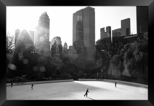 Ice Skating - Central Park Framed Print by Simon Wrigglesworth