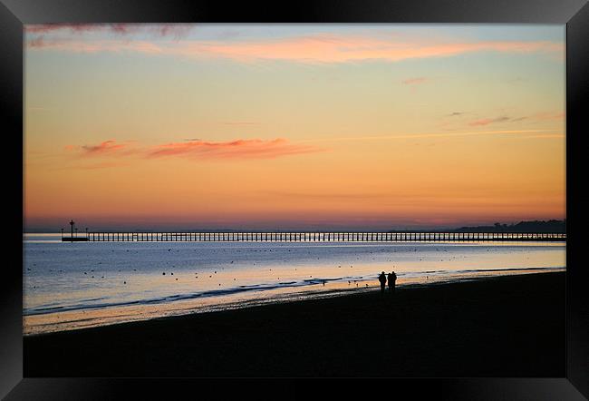 A Sunset Stroll Framed Print by graham young