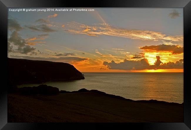Woody Bay Sunset  Framed Print by graham young