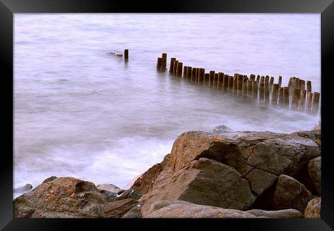 Groyne and Rocks  Framed Print by graham young