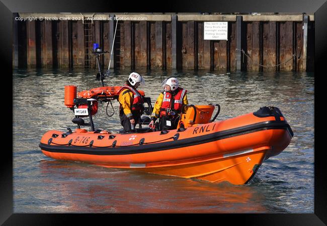 Dramatic RNLI Rescue in Weymouth Framed Print by Nicola Clark