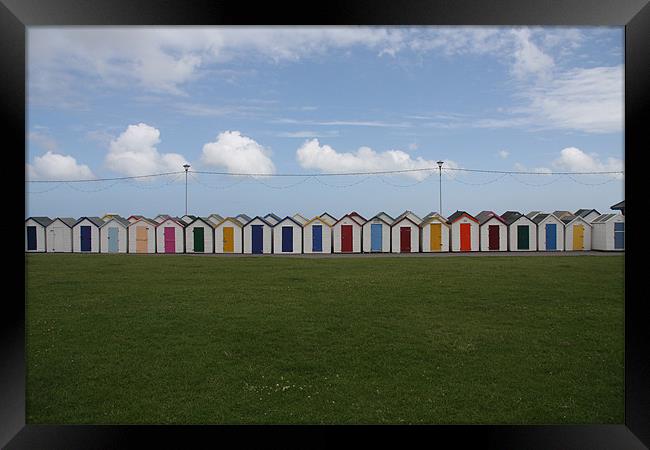 Beach Huts Framed Print by Michael Pound