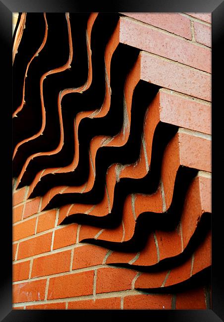 Twist in Bricks Framed Print by Christine Lake