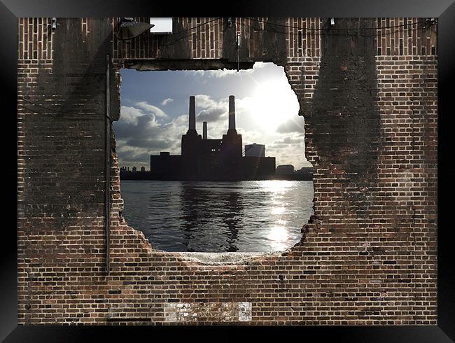 Hole in the wall Framed Print by Julie Skone