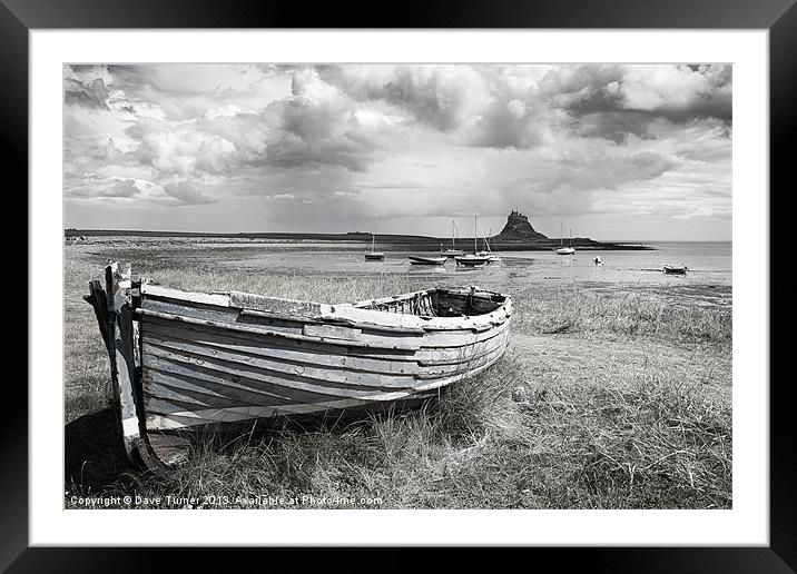 Lindisfarne Castle and Boat Framed Mounted Print by Dave Turner