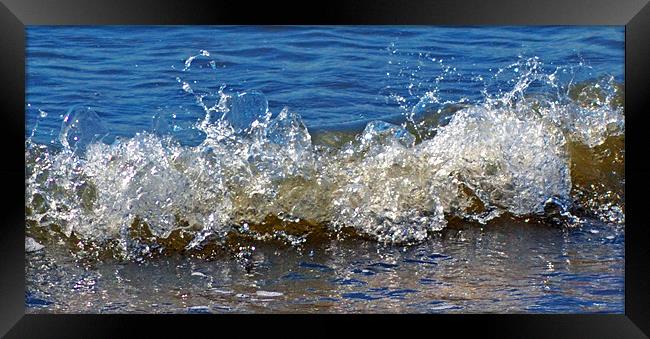 wave splash Framed Print by Donna Collett