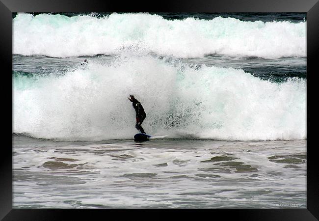 The Unknown Surfer Framed Print by Nigel Coomber