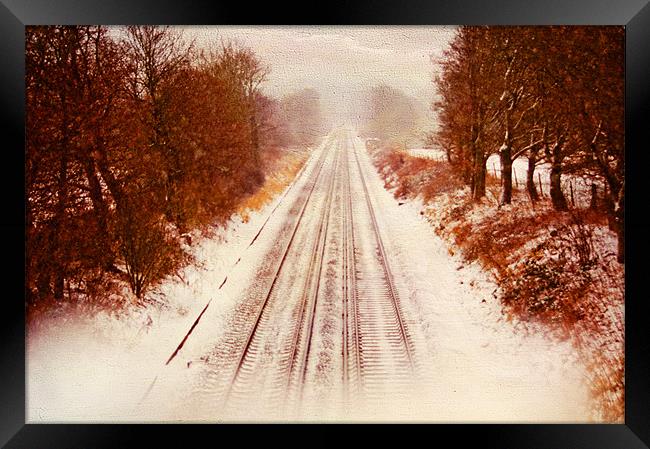 snow on the tracks. Framed Print by Dawn Cox