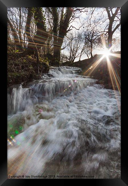 LENS FLARE with gushing stream, winter Framed Print by Izzy Standbridge