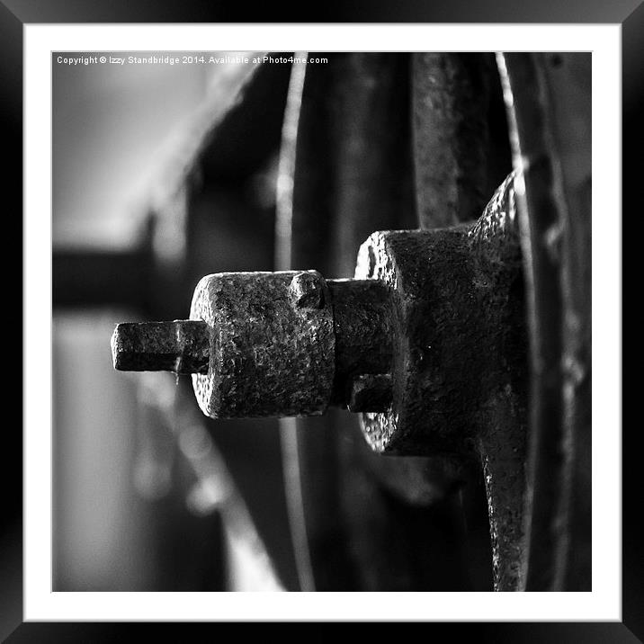 Antique wheel on large machinery Framed Mounted Print by Izzy Standbridge