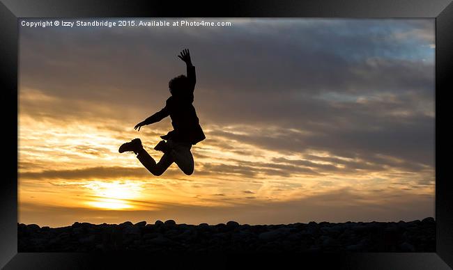  Joyous leap at sunset Framed Print by Izzy Standbridge