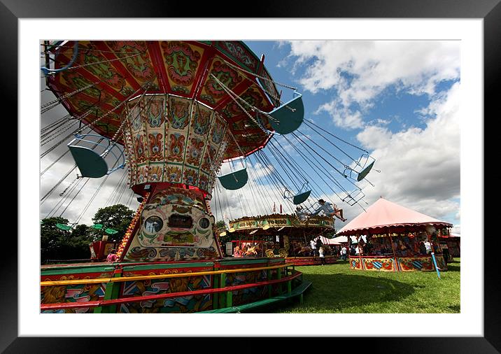Fairground chair-o-planes ride Framed Mounted Print by Tony Bates