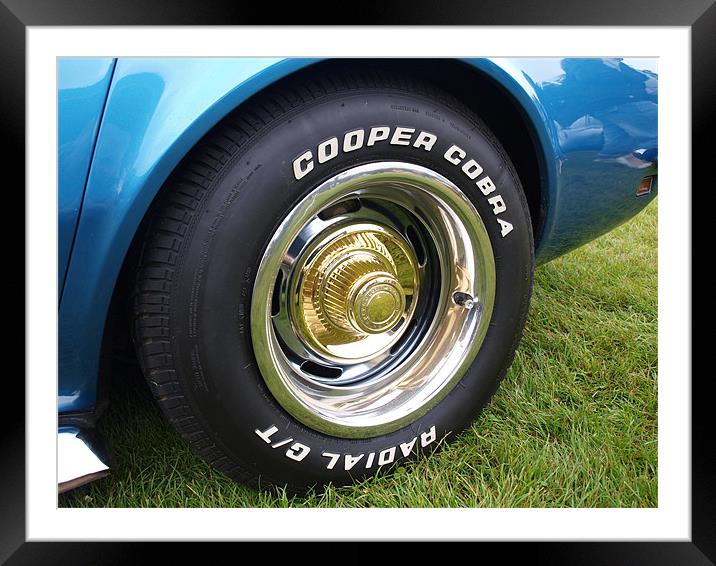 Blue Corvette front wheel Framed Mounted Print by Allan Briggs
