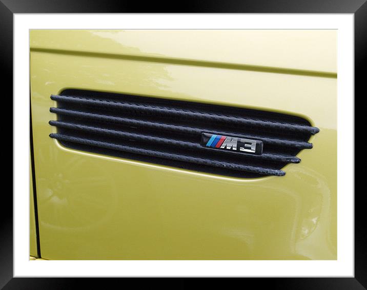 Gold BMW side air vent trim Framed Mounted Print by Allan Briggs