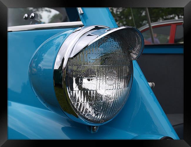 Blue Isetta bubble car headlight Framed Print by Allan Briggs