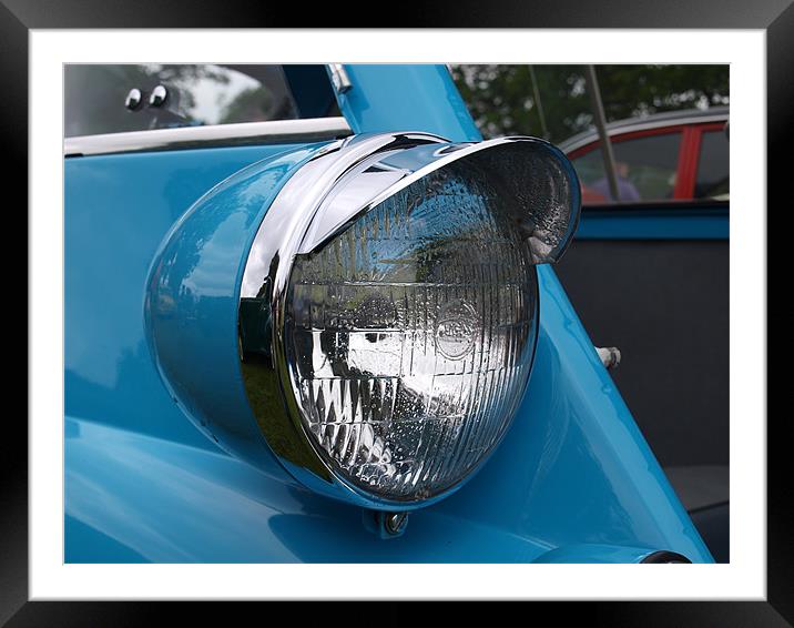 Blue Isetta bubble car headlight Framed Mounted Print by Allan Briggs