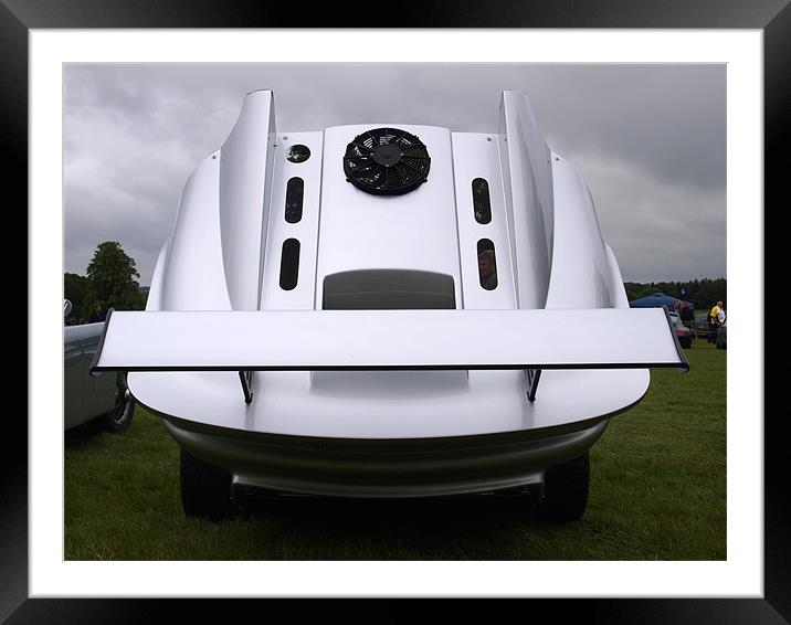 Silver sports car with rear engine cover open Framed Mounted Print by Allan Briggs
