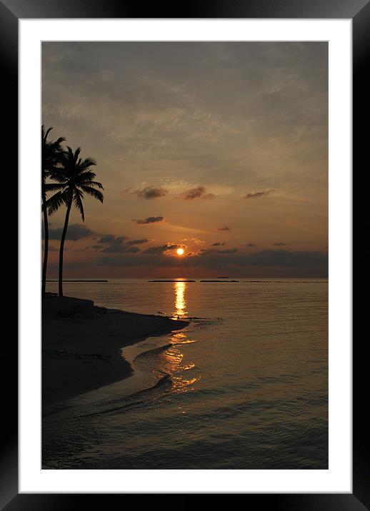 Sun setting behind clouds - Maldives Framed Mounted Print by Madeline Harris