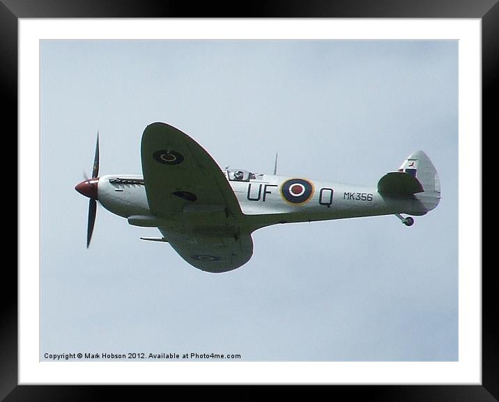 Spitfire in Flight Framed Mounted Print by Mark Hobson